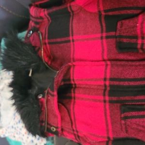 Red with fur on top vest